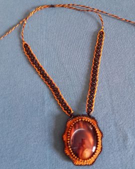 Collier soleil noir