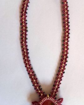 Collier soleil rose